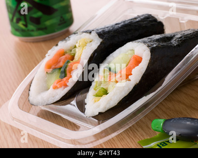 Hand Moulded Sushi With A Can Of Green Tea Stock Photo