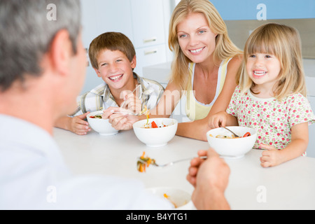 Family Eating A Meal Together Stock Photo