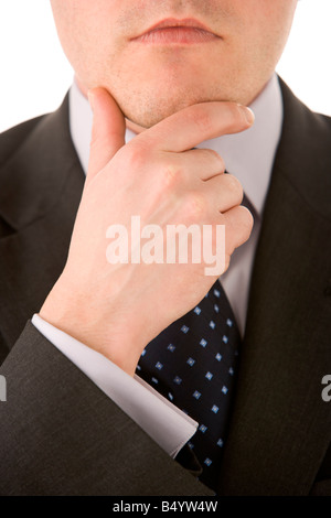 Businessman Holding His Chin Stock Photo
