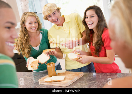 Teenagers Making Sandwiches Stock Photo