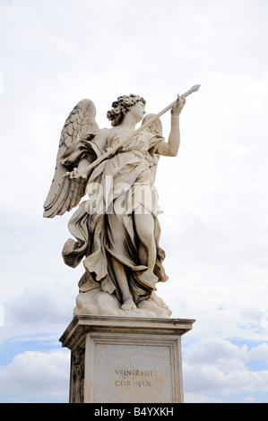 A marble Bernini Angel with Lance on Ponte Sant' Angelo in Rome. Stock Photo