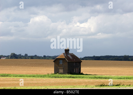 Boarded-up house, Felixstowe Ferry, Suffolk, UK. Stock Photo