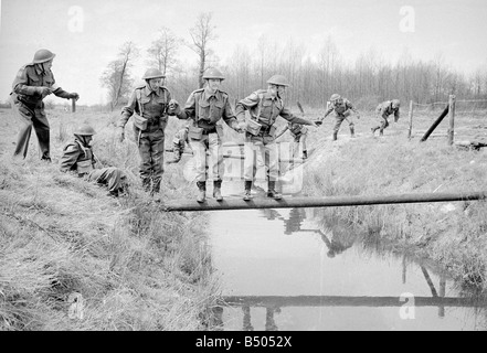 Dads Army ;Actor Clive Dunn who plays Corporal Jones Ian Lavender as pike , James Beck as Private Walker, John Laurie as Frasier and Arnold Ridley as Godfrey, in the BBC TV series Dads Army seen filming on location in Thetford Norfolk.;The cast were filming an assault course scene.;72 4866;©DM Stock Photo