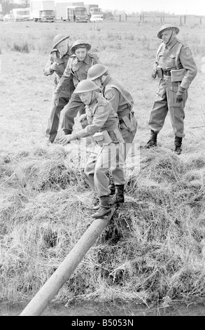 Dads Army ;Actor Clive Dunn who plays Corporal Jones right to left Ian Lavender as pike , James Beck as Private Walker, John Laurie as Frasier and Arnold Ridley as Godfrey in the BBC TV series Dads Army seen filming on location in Thetford Norfolk.;The cast were filming an assault course scene.;72 4866;©DM;Anglia Press for DM Stock Photo