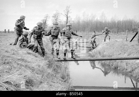 Dads Army ;Actor Clive Dunn who plays Corporal Jones right to left Ian Lavender as pike , James Beck as Private Walker, John Laurie as Frasier and Arnold Ridley as Godfrey in the BBC TV series Dads Army seen filming on location in Thetford Norfolk.;The cast were filming an assault course scene.;72 4866;©DM;Anglia Press for DM Stock Photo