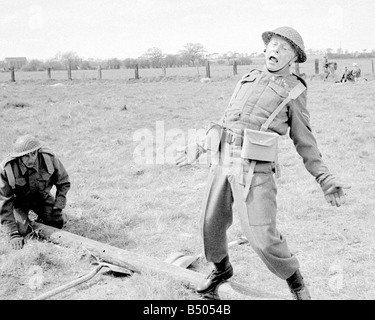 Dads Army ;Actor Clive Dunn who plays Corporal Jones right and John Laurie as Private Frasier in the BBC TV series Dads Army seen filming on location in Thetford Norfolk.;The cast were filming an assault course scene.;72 4866;©DM;Anglia Press for DM Stock Photo