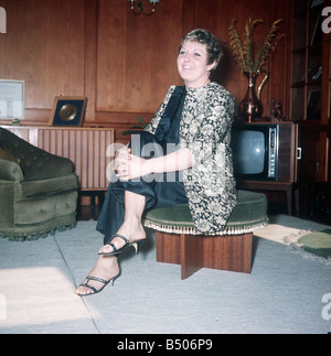 Linda Jones wife of Singer Tom Jones sitting down in the living room at their home Stock Photo