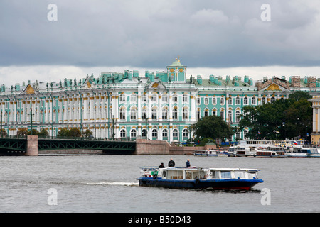 Boat sailing in the Neva River with the Winter Palace in the background St Petersburg Russia Stock Photo