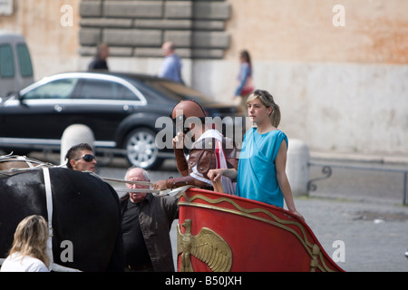 Centurion and bride  on a horse and chariot in the Piazza del Popolo in Rome, Italy Stock Photo