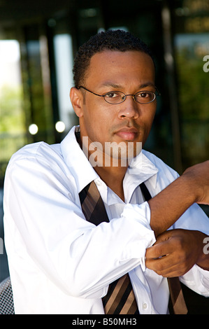 An confident and successful African American businessman in a power suit Stock Photo