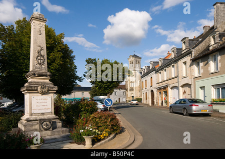 Town square and church St-Gervais-les-Trois-Clochers, Vienne, France. Stock Photo