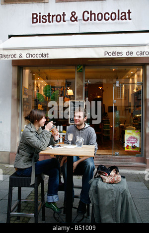 Sep 2008 - Young couple sitting at a cafe Strasbourg Alsace France Stock Photo