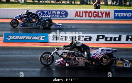 Top Fuel Bike Purple Princess Driven By Steve Carey Drag Racing at Santa Pod, England. Stock Photo