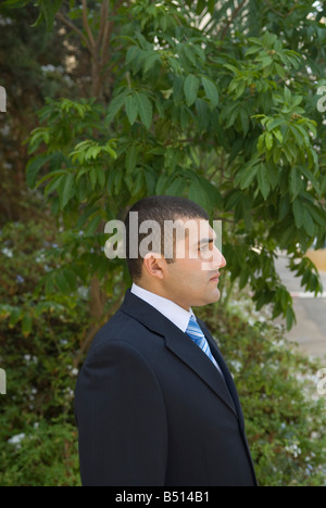 Serious business man outdoors Stock Photo