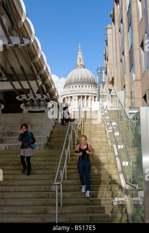 Steps leading to Millennium Bridge with St Pauls cathedral in the background Stock Photo