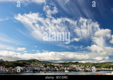 Clouds in blue sky over island of Faial Stock Photo