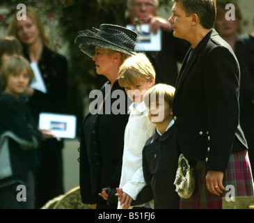 Caron Keating Funeral April 2004 St Peters Church in the grounds of Hever Castle in Kent Picture shows mother Gloria Hunniford children sons Charlie Lindsay Gabriel Lindsay husband Russ Lindsay Stock Photo