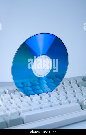 DVD on computer keyboard Stock Photo