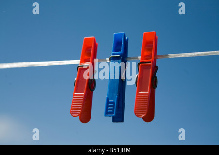 red blue red linen clips on a clothesline Stock Photo