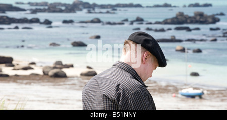 Frenchman on the beach in Finistere in Brittany in France Stock Photo