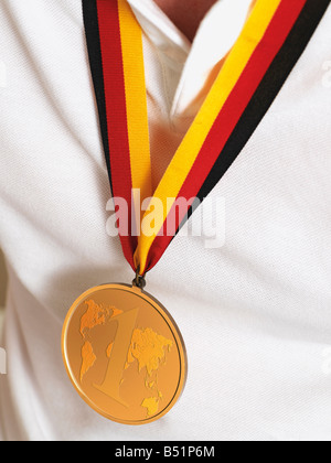 Man in Sport Shirt Wearing Gold Medal