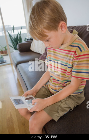 Boy Playing Video Games Stock Photo