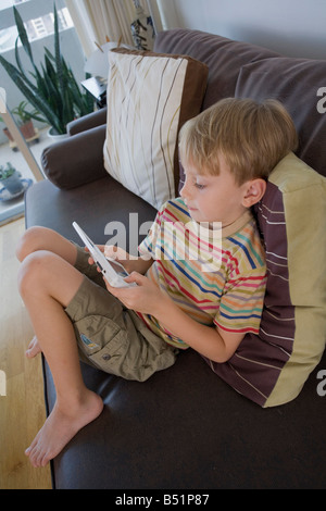 Boy Playing Video Games Stock Photo