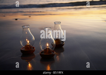 Oil Lamps on Beach, Mexico Stock Photo