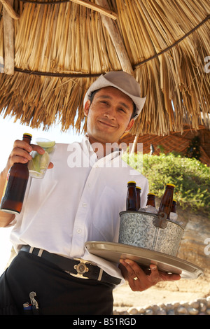 Portrait of Waiter at Beach, Mexico Stock Photo