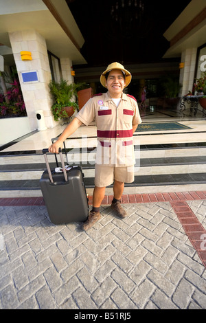 Portrait of Bellhop in Front of Hotel, Mayan Riviera, Mexico Stock Photo