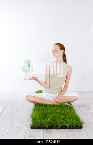 young woman with fan Stock Photo