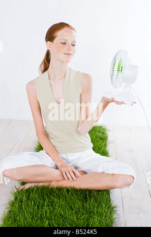 young woman with fan Stock Photo