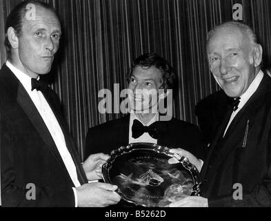 Lester Piggott Horse Racing enjoys Wilfred Hyde Whites joke as he presents trainer John Dunlop with a salver at London Press Clubs pre Derby dinner Stock Photo