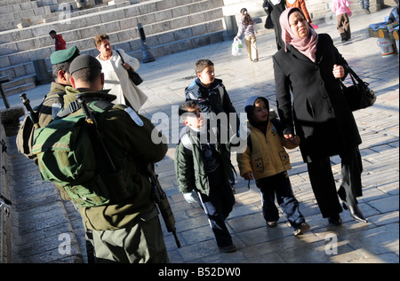 Israeli soldiers on patrol outside the Damascus Gate of Jerusalem's Old City. Stock Photo