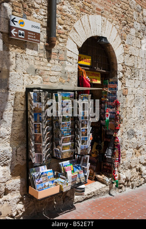 Doorway of a typical shop selling postcardes etc in the centre of the old town, San Gimignano, Tuscany, Italy Stock Photo