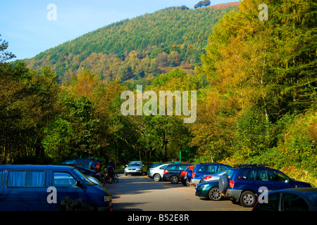 Cars in visitor centre car park Cwmcarn Forest Drive South Wales Stock Photo