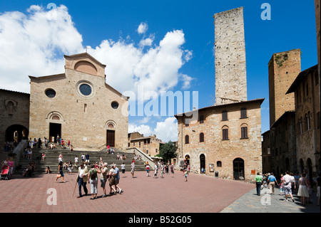 The Collegiata (Duomo) and historic towers from the Piazza del Duomo, San Gimignano, Tuscany, Italy Stock Photo