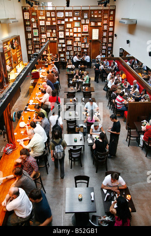 March 2008 - People sitting at Antares restaurant in the trendy area of Palermo Viejo known as Soho Buenos Aires Argentina Stock Photo