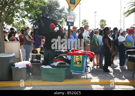 Man selling Barack Obama t-shirts to the crowd outside the Obama Early Vote for Change Rally in Orlando FL Stock Photo