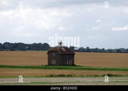 Boarded-up house, Felixstowe Ferry, Suffolk, UK. Stock Photo