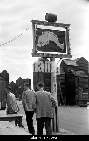 Holiday scenes in an around Hastings. The men leave the wives and go for a lunch time pint. June 1952 C2779-004 Stock Photo