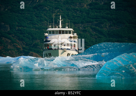 Cruise West *Spirit of Columbia* among icebergs in Tracy Arm Fords-Terror Wilderness Area SE Alaska Stock Photo