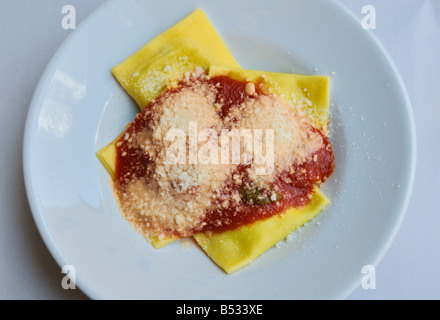 Ravioli with ricotta in a tomato sauce Stock Photo