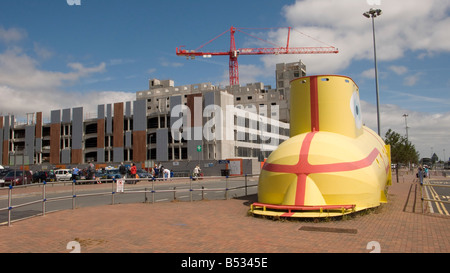 Yellow submarine parked outside John Lennon Airport in Liverpool UK Stock Photo