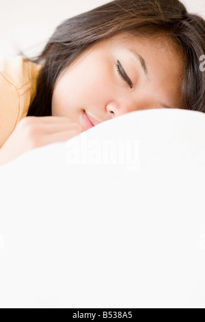 Close up of Asian woman sleeping Stock Photo