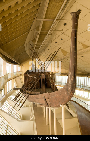 The Khufu or Cheops ship intact full-size vessel from Ancient Egypt displayed in the Giza Solar boat museum in the Giza pyramid complex Cairo Egypt Stock Photo