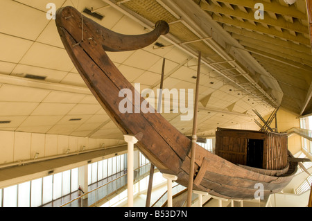 The Khufu or Cheops ship intact full-size vessel from Ancient Egypt displayed in the Giza Solar boat museum in the Giza pyramid complex Cairo Egypt Stock Photo