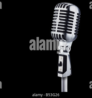 Vintage microphone on black background Stock Photo