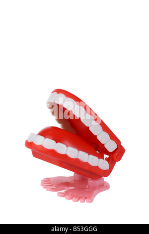 Wind up chattering teeth toy cutout isolated on white background Stock Photo