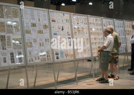 Stamp collectors admire collections at an American Philatelic Society stamp show in Hartford Connecticut USA Stock Photo